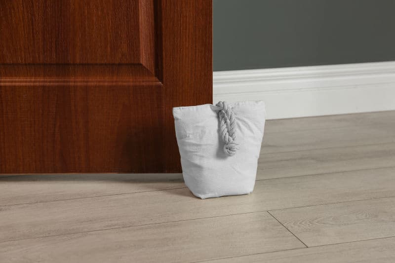 Prevent your door from slamming with a soft cushion that can be placed in front of the door.